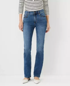 Sculpting Pocket Mid Rise Boot Cut Jeans In Mid Stone Wash