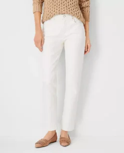 Sculpting Pocket Mid Rise Tapered Jeans In Ivory