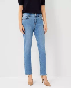 Sculpting Pocket Mid Rise Tapered Jeans In Light Vintage Indigo Wash
