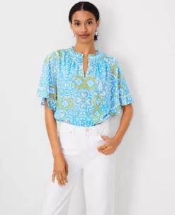 Tile Print Cutout Flutter Sleeve Top